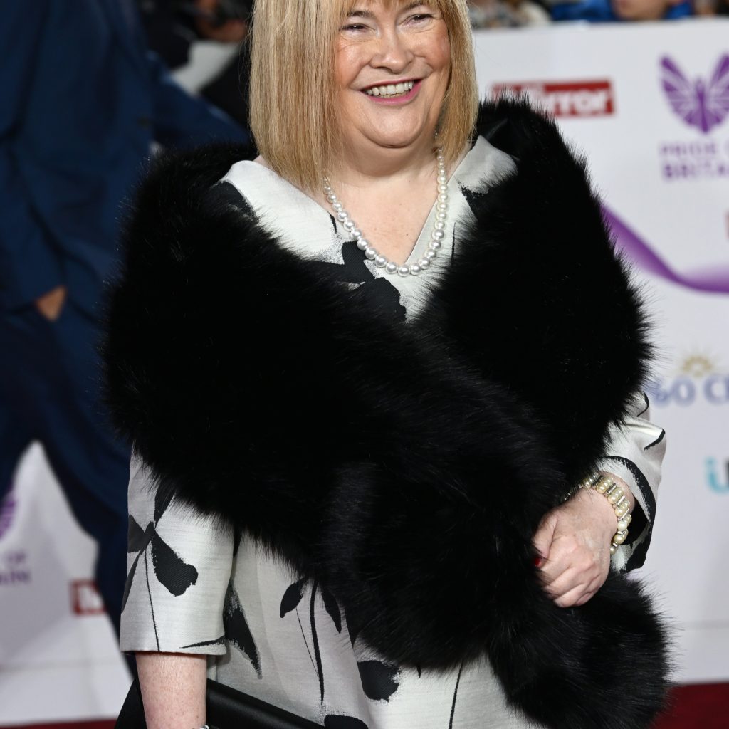 Susan Boyle Debuts Dramatic Red Carpet Makeover at British Awards Show