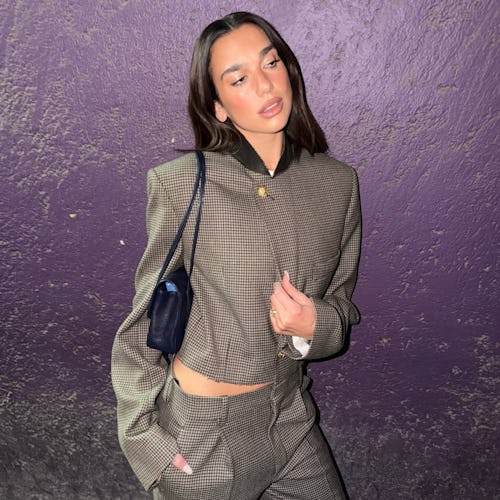 Dua Lipa Puts a New Twist on the Chanel Suit Worn by Michelle Obama