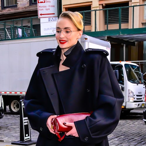 Sophie Turner Goes Into Office Mode in ’80s Trench & Sleek Skirt Suit