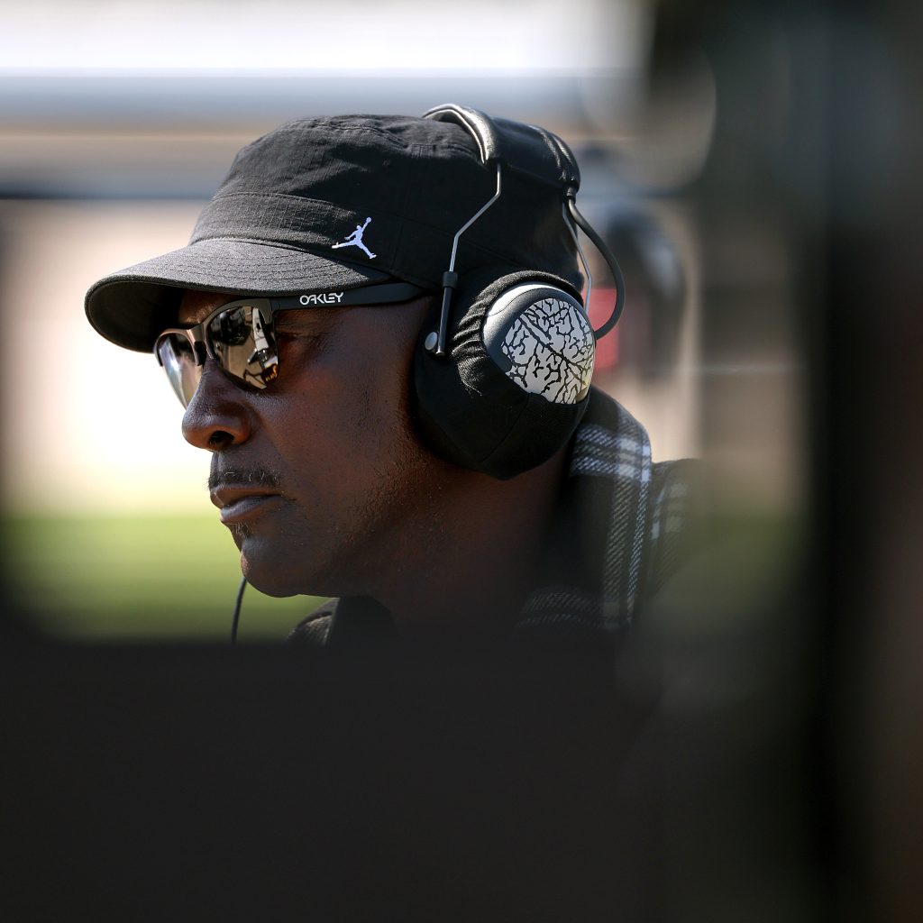 Denny Hamlin Reacts to Michael Jordan’s Viral Choke-Kiss Moment After NASCAR Race