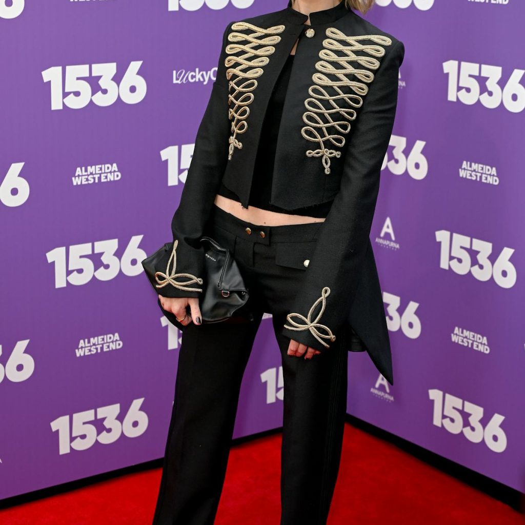 Margot Robbie Pairs a Band-Geek Jacket with Ultra Low-Rise Bumsters