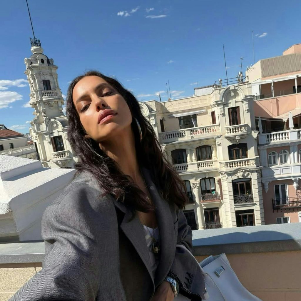 Irina Shayk Pairs a Sheer Dress with Dad Sneakers