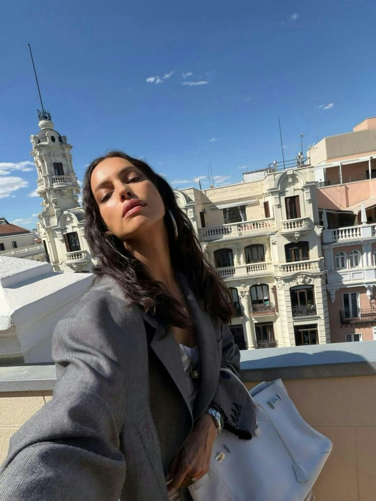 Irina Shayk Pairs a Sheer Dress with Dad Sneakers