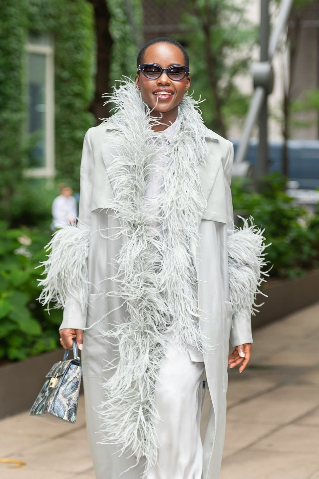 Lupita Nyong’o Effortlessly Floats Into 'The Odyssey' Press Tour