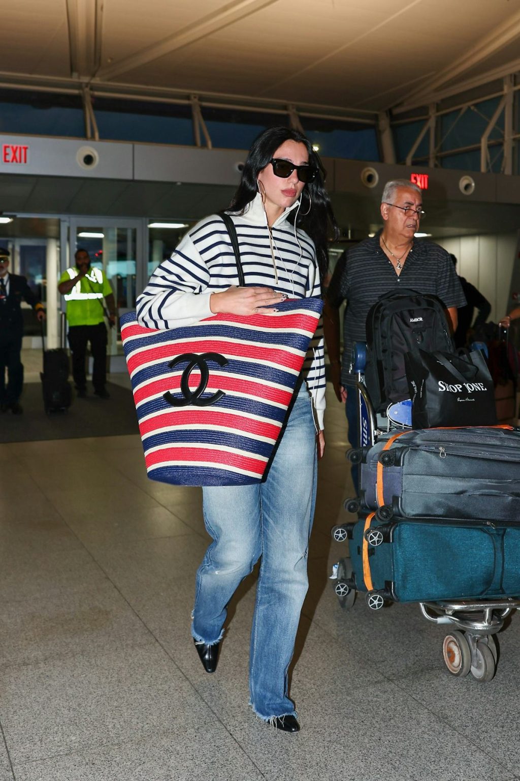 Dua Lipa's Giant Chanel Basket Bag Tests the Limits of Carry-On Luggage